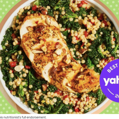 Plate with chicken, kale greens and couscous