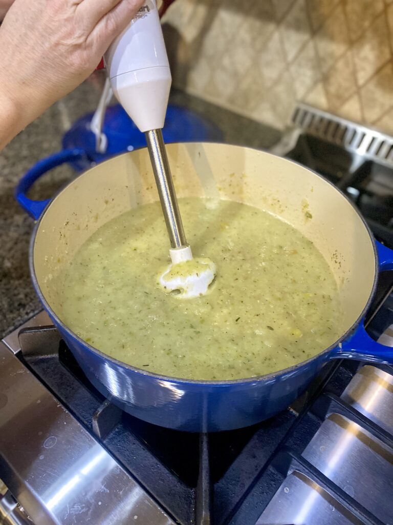 Blending soup in pot with immersion blender
