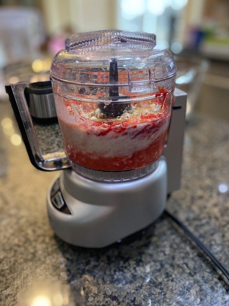 wet ingredients in blender starting to mix