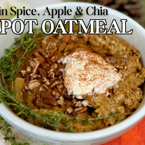 pumpkin spice oatmeal with greek yogurt dollop and cinnamon sprinkle and chopped pecans in white bowl