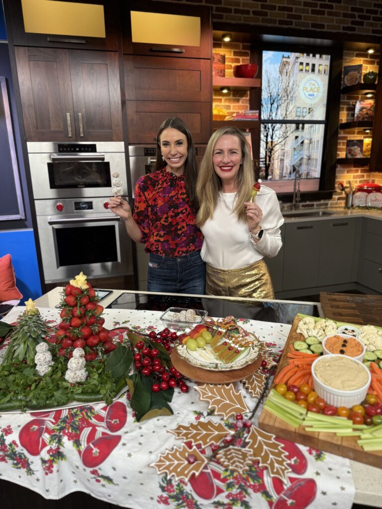 Sheila Patterson & Ashley Hawke on Fox13 The Place segment featuring holiday boards